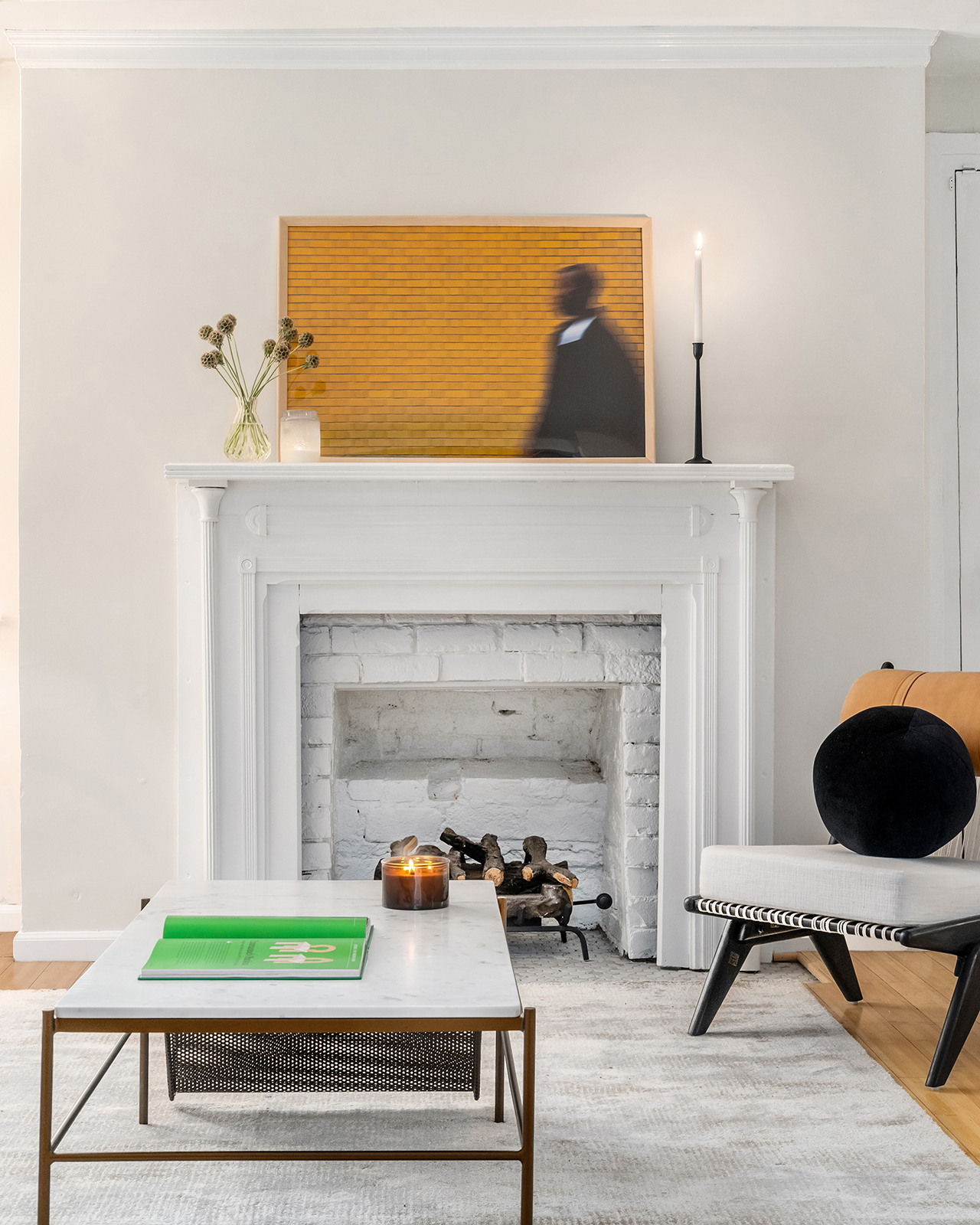 162 9th Avenue, Unit B Manhattan, NY 10035 - Photo 4 of 9 a living room with furniture and a fireplace