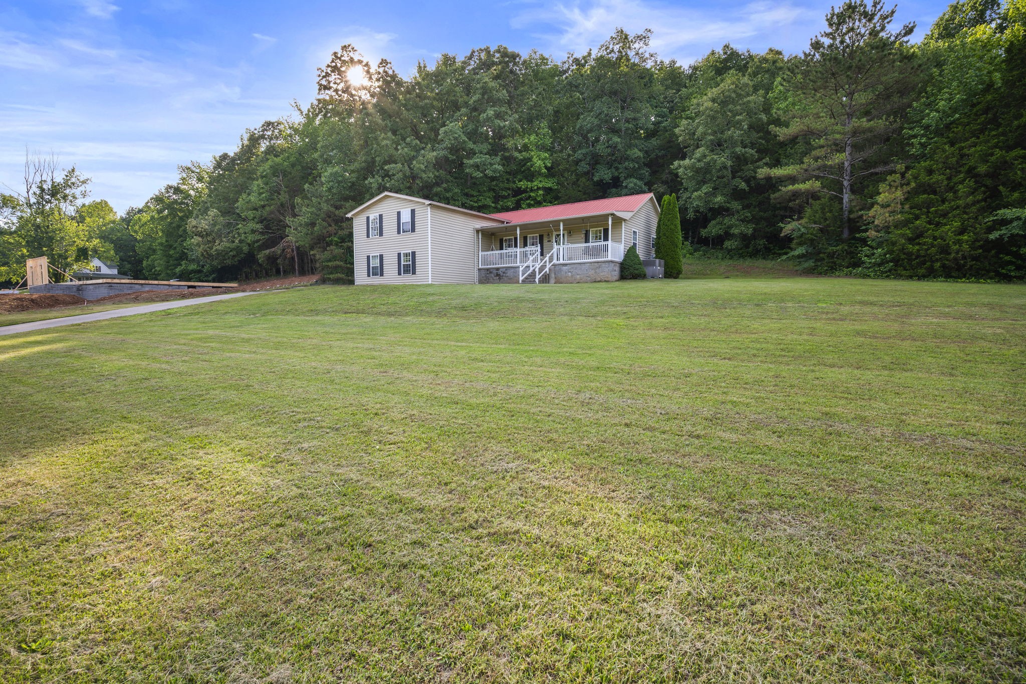 1197 Biter Road Cunningham, TN 37052 - Photo 34 of 38 a view of a deck with a trees