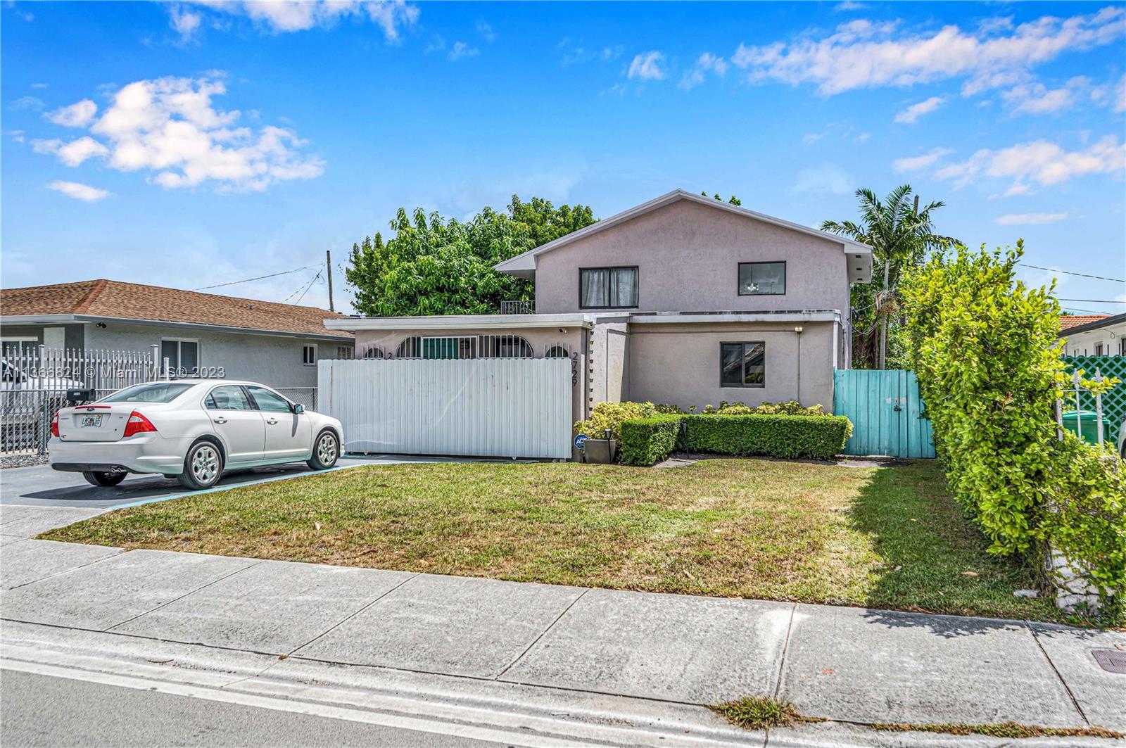 2729 Southwest 67th Avenue Miami, FL 33155 - Photo 1 of 37 a view of a house with a patio