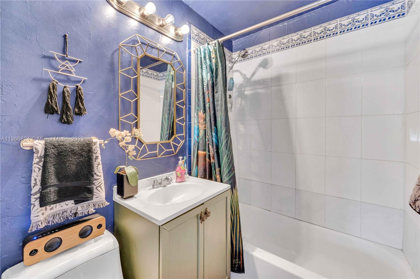 2729 Southwest 67th Avenue Miami, FL 33155 - Photo 19 of 37 a bathroom with a sink and a mirror