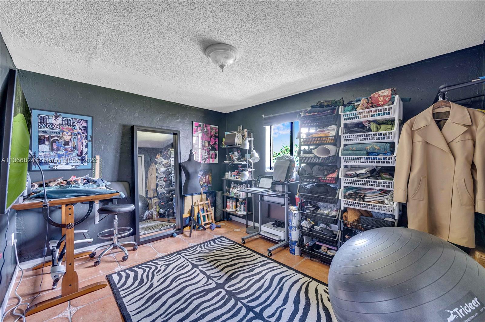 2729 Southwest 67th Avenue Miami, FL 33155 - Photo 20 of 37 a living room with lots of furniture and wooden floor