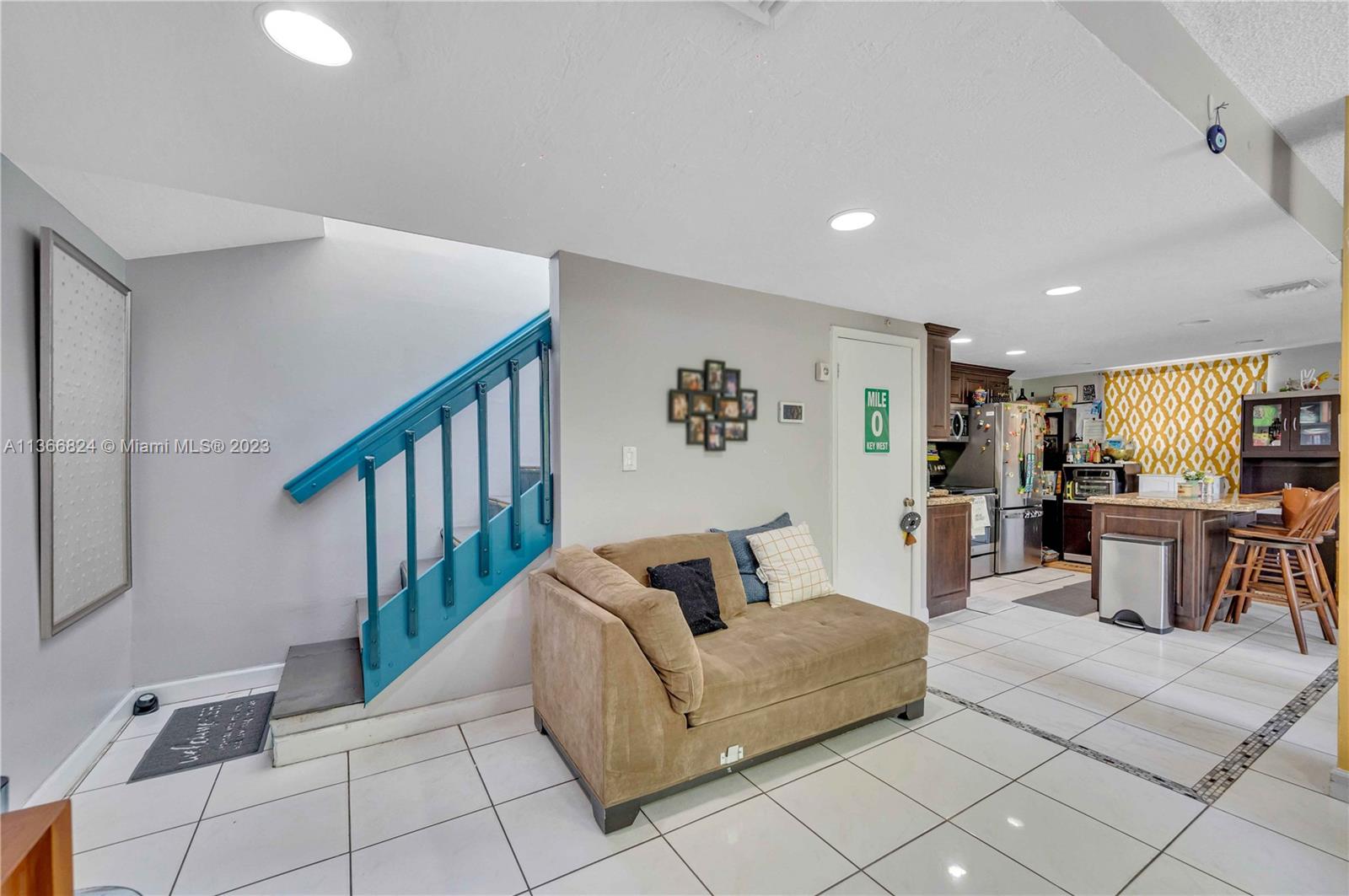 2729 Southwest 67th Avenue Miami, FL 33155 - Photo 26 of 37 a living room with furniture and a dining table