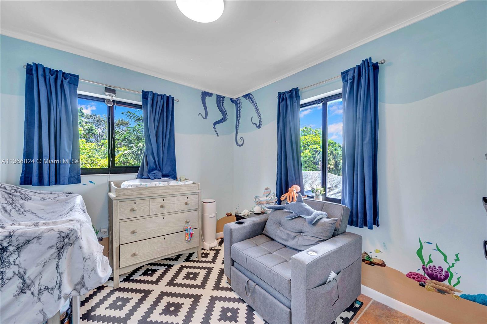 2729 Southwest 67th Avenue Miami, FL 33155 - Photo 32 of 37 a bed room with a bed and a window