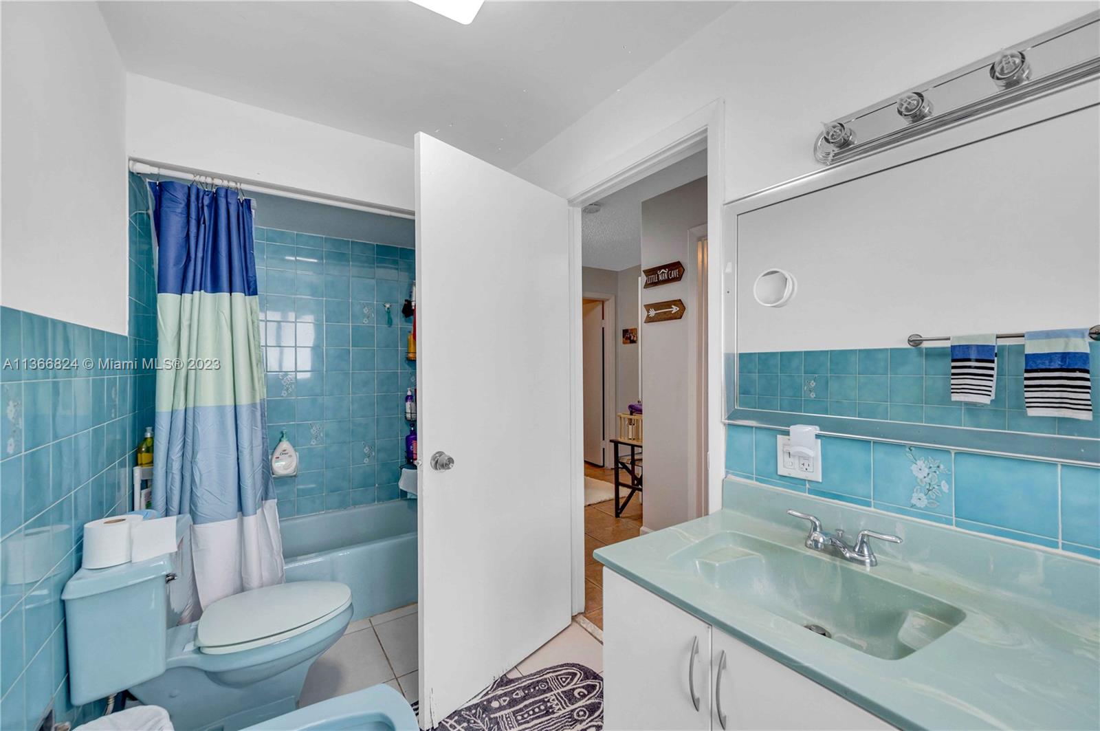 2729 Southwest 67th Avenue Miami, FL 33155 - Photo 34 of 37 a bathroom with a sink toilet and shower