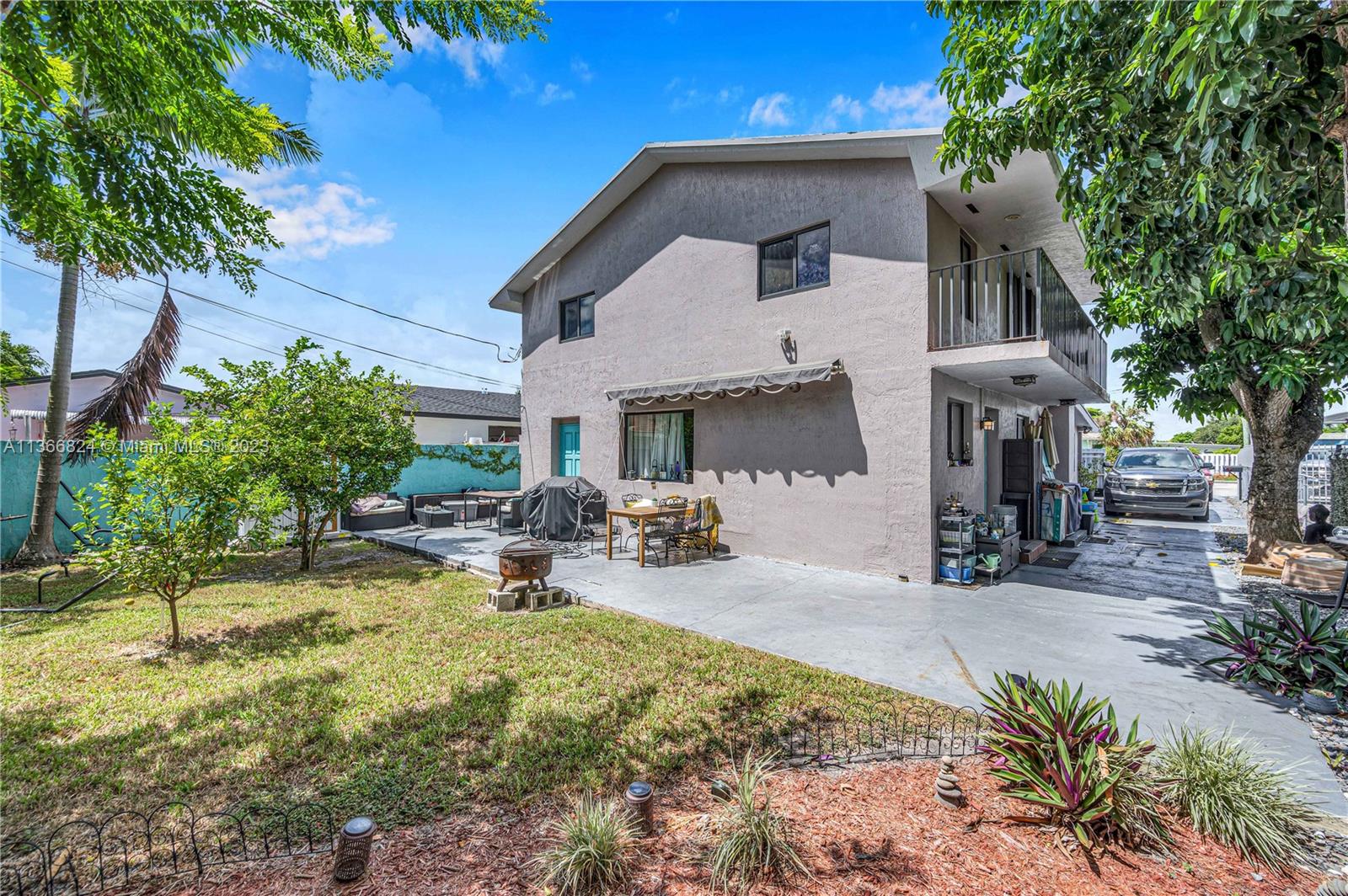 2729 Southwest 67th Avenue Miami, FL 33155 - Photo 5 of 37 a view of a house with backyard porch and sitting area