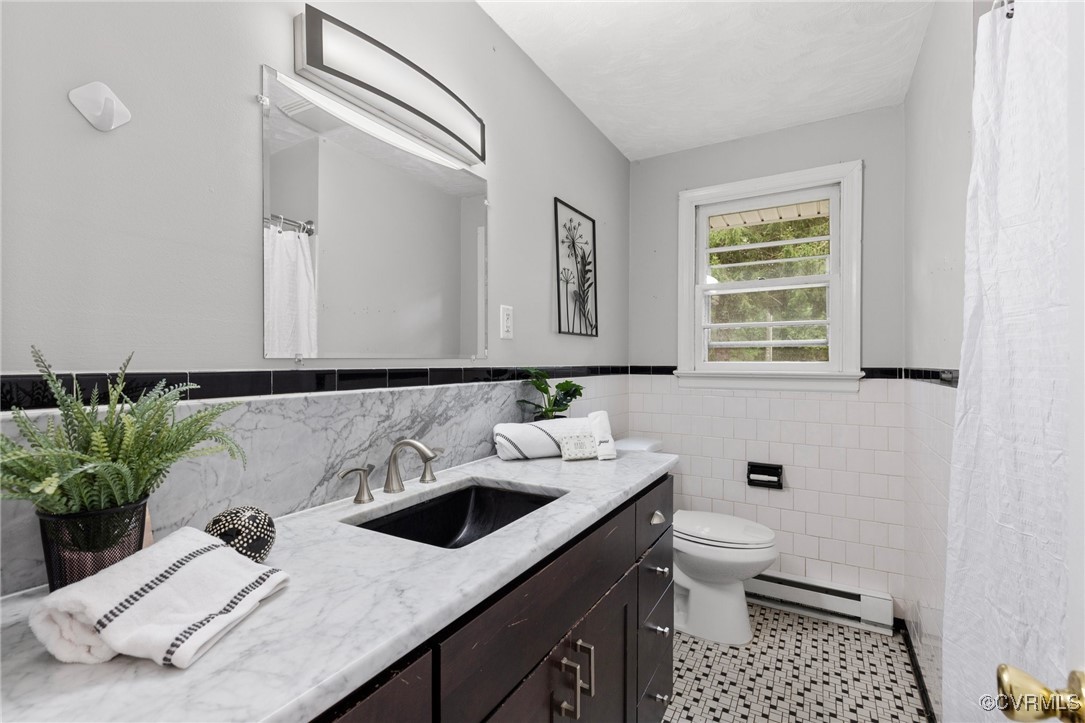 7716 Old Beach Road Chesterfield, VA 23838 - Photo 12 of 24 a bathroom with a sink and a toilet