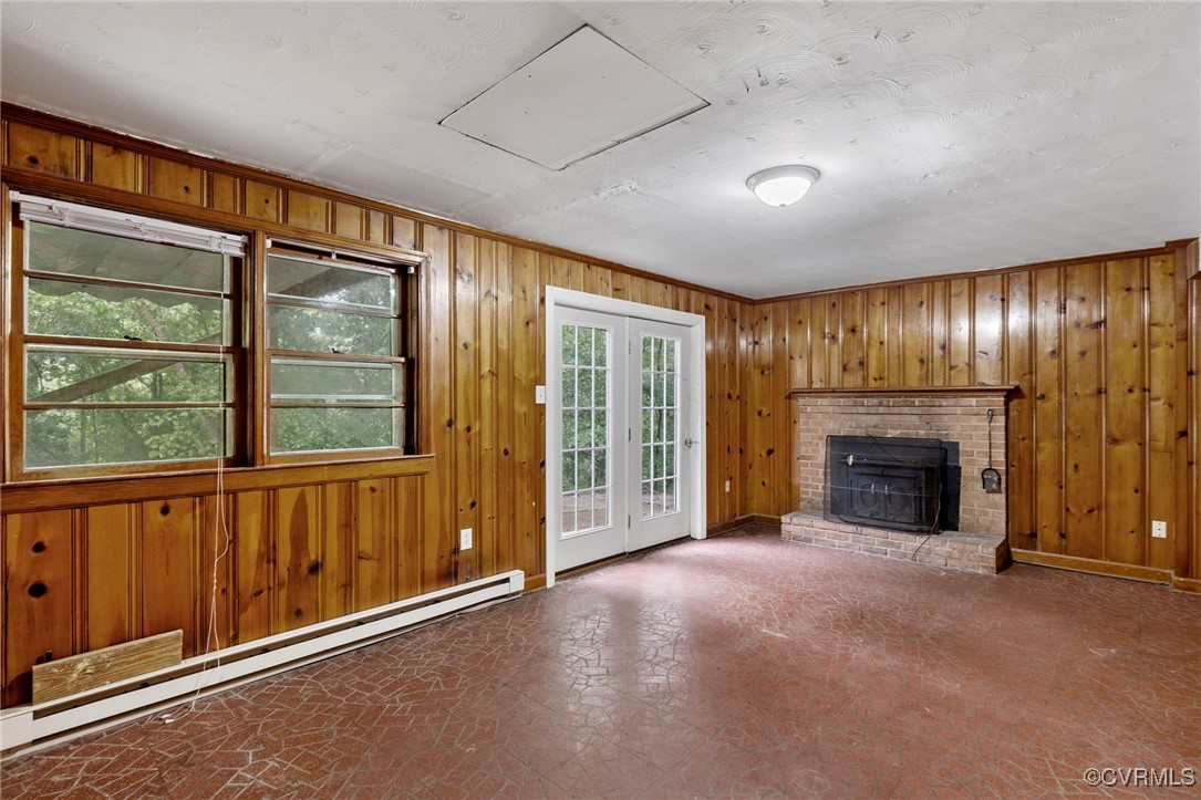7716 Old Beach Road Chesterfield, VA 23838 - Photo 20 of 24 an empty room with windows fire place and windows
