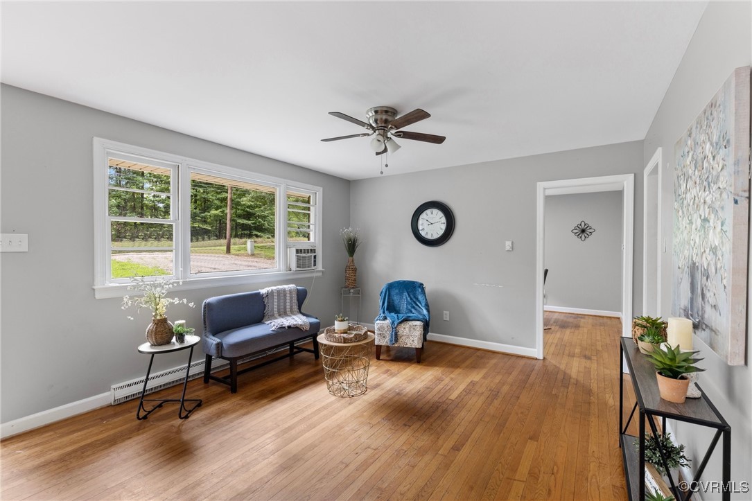 7716 Old Beach Road Chesterfield, VA 23838 - Photo 5 of 24 a view of a workspace with furniture and a window