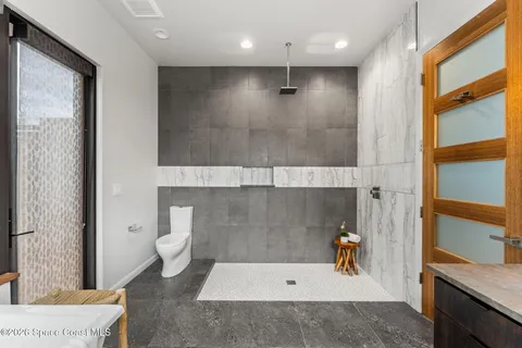 a workspace with furniture and wooden floor