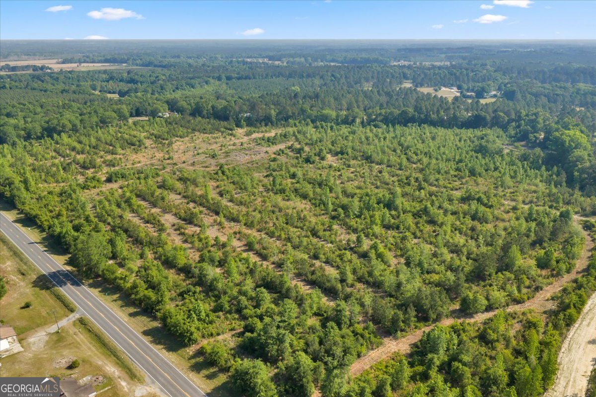 3150 Highway 441 Rentz, GA 31075 - Photo 8 of 23 a view of a yard with an outdoor seating