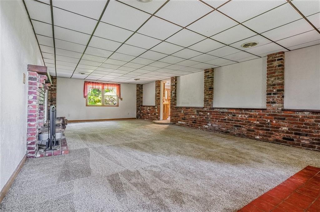 511 Markeys Road Ruffs Dale, PA 15679 - Photo 5 of 45 a view of an empty room with a window