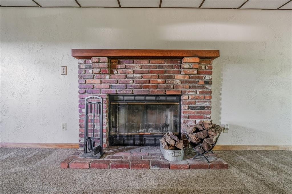 511 Markeys Road Ruffs Dale, PA 15679 - Photo 8 of 45 a living room with fireplace