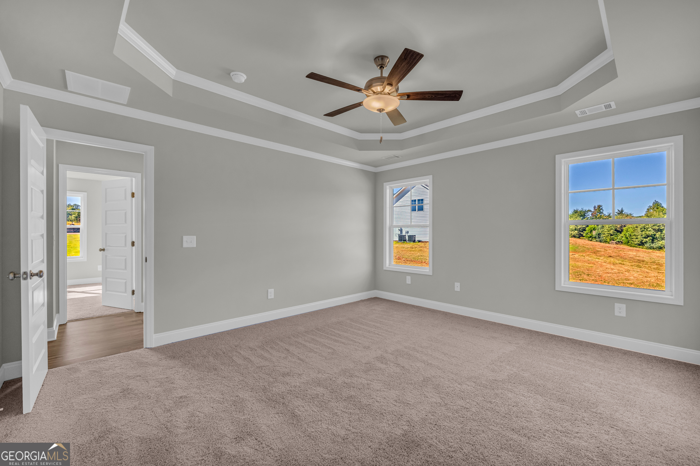 40 Sewell Road Lavonia, GA 30553 - Photo 14 of 29 a view of a livingroom with a ceiling fan and window