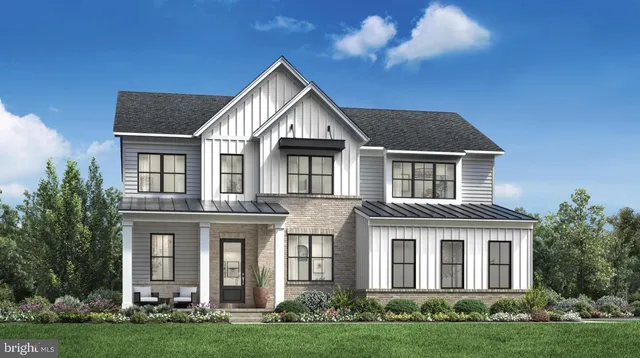 front view of residential houses with a yard