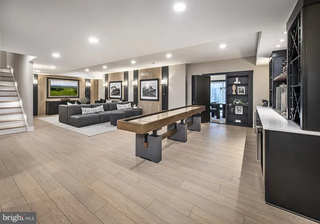 a lobby with furniture and wooden floor