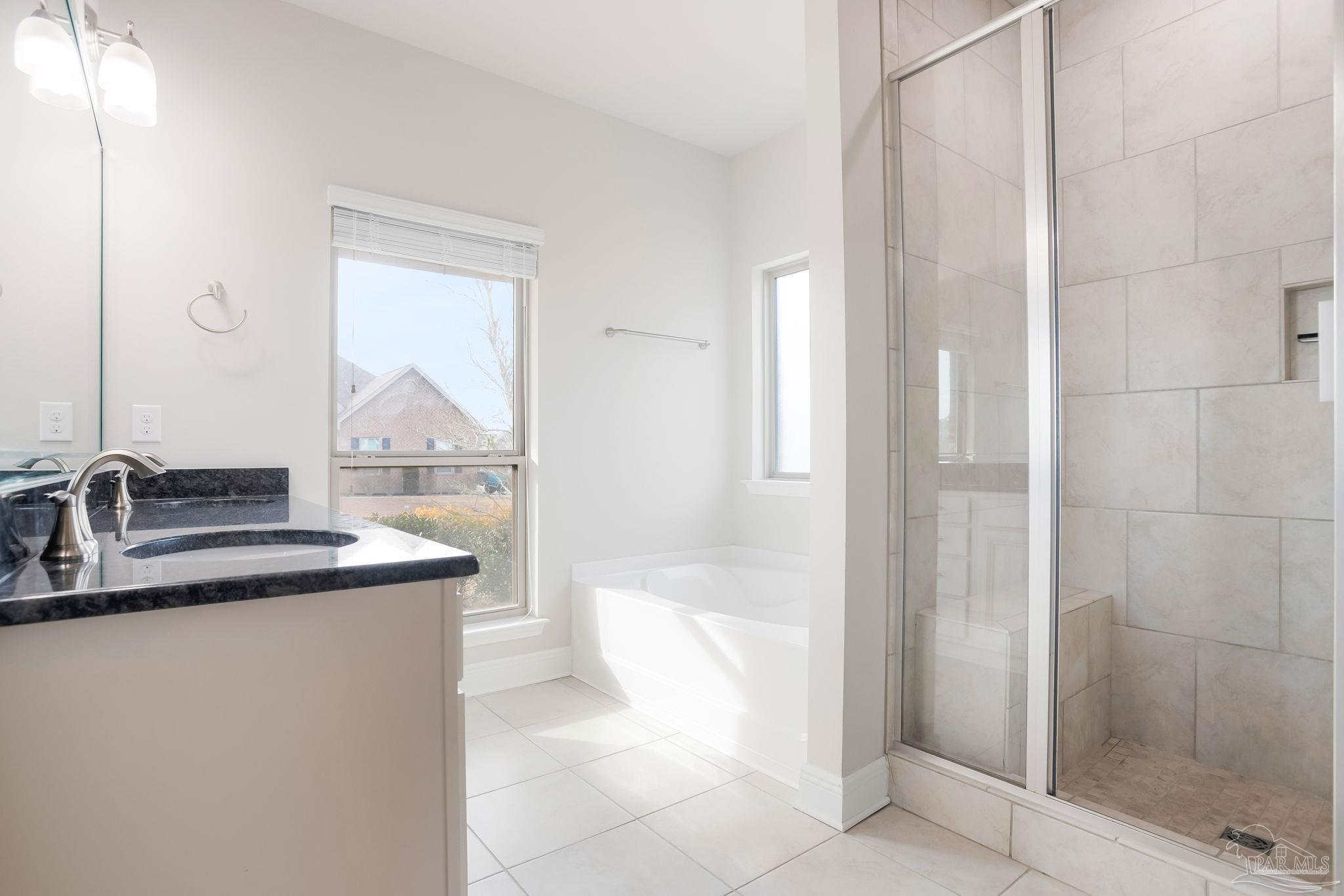 8016 Woodbrook Road Pensacola, FL 32526 - Photo 24 of 52 a bathroom with a sink and a mirror