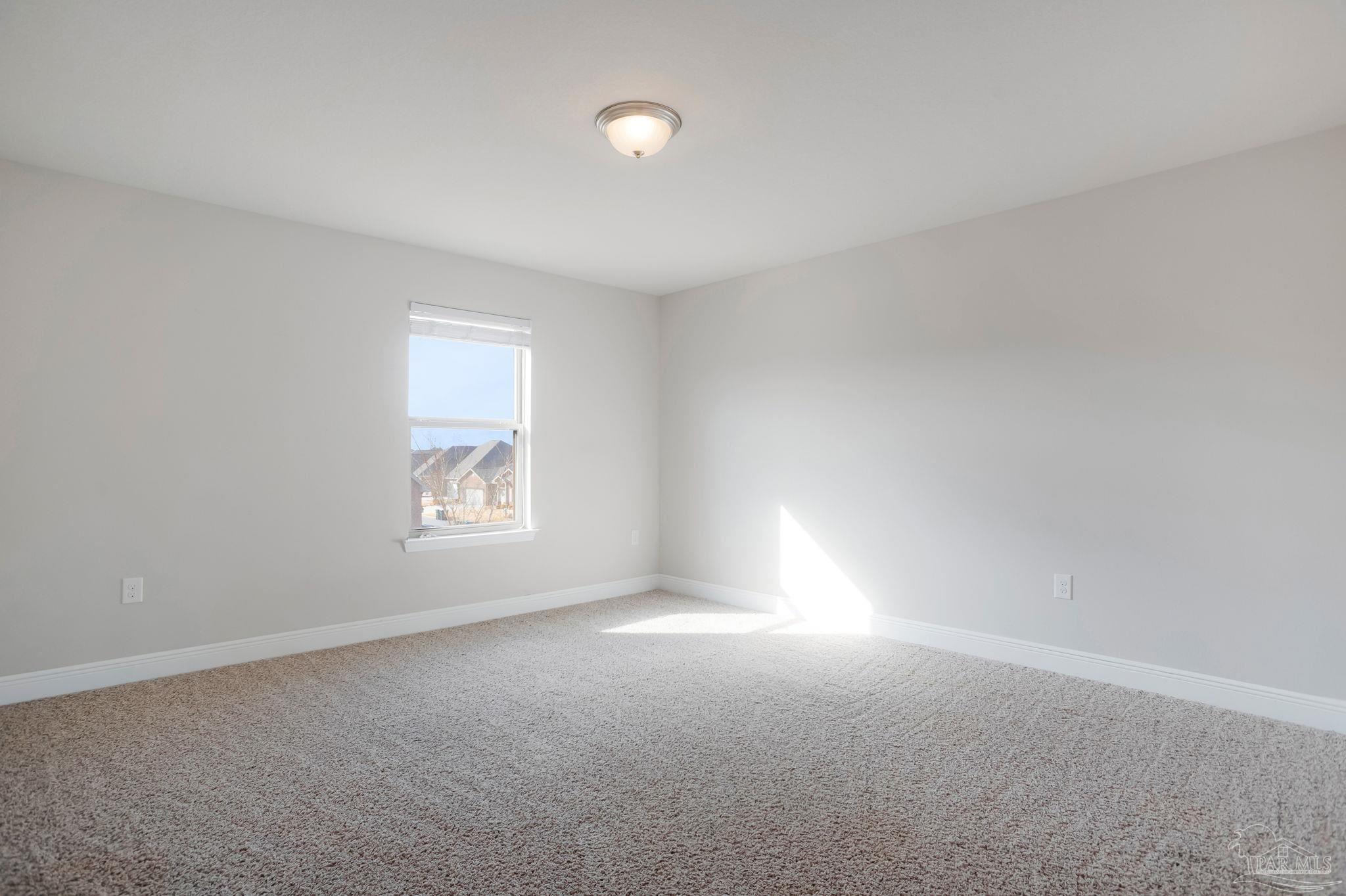 8016 Woodbrook Road Pensacola, FL 32526 - Photo 36 of 52 an empty room with a window