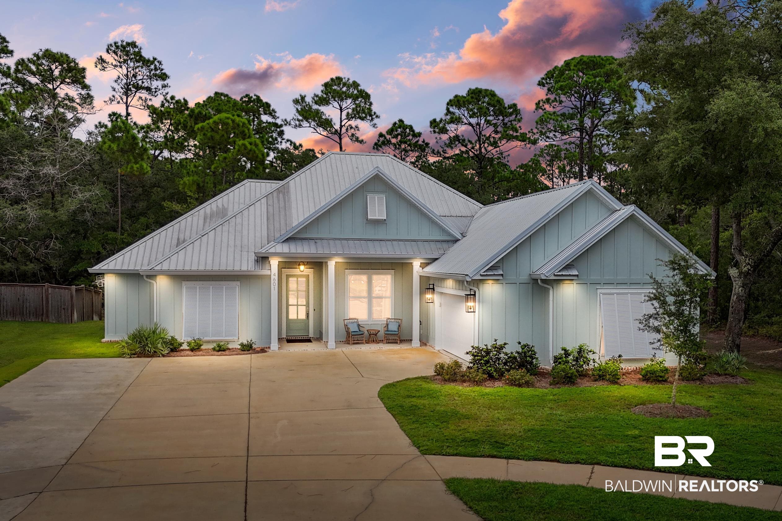 4601 Surrey Lane Orange Beach, AL 36561 - Photo 1 of 43 View of front facade featuring a lawn