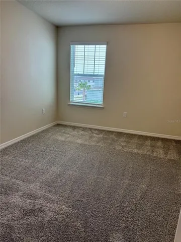 an empty room with window