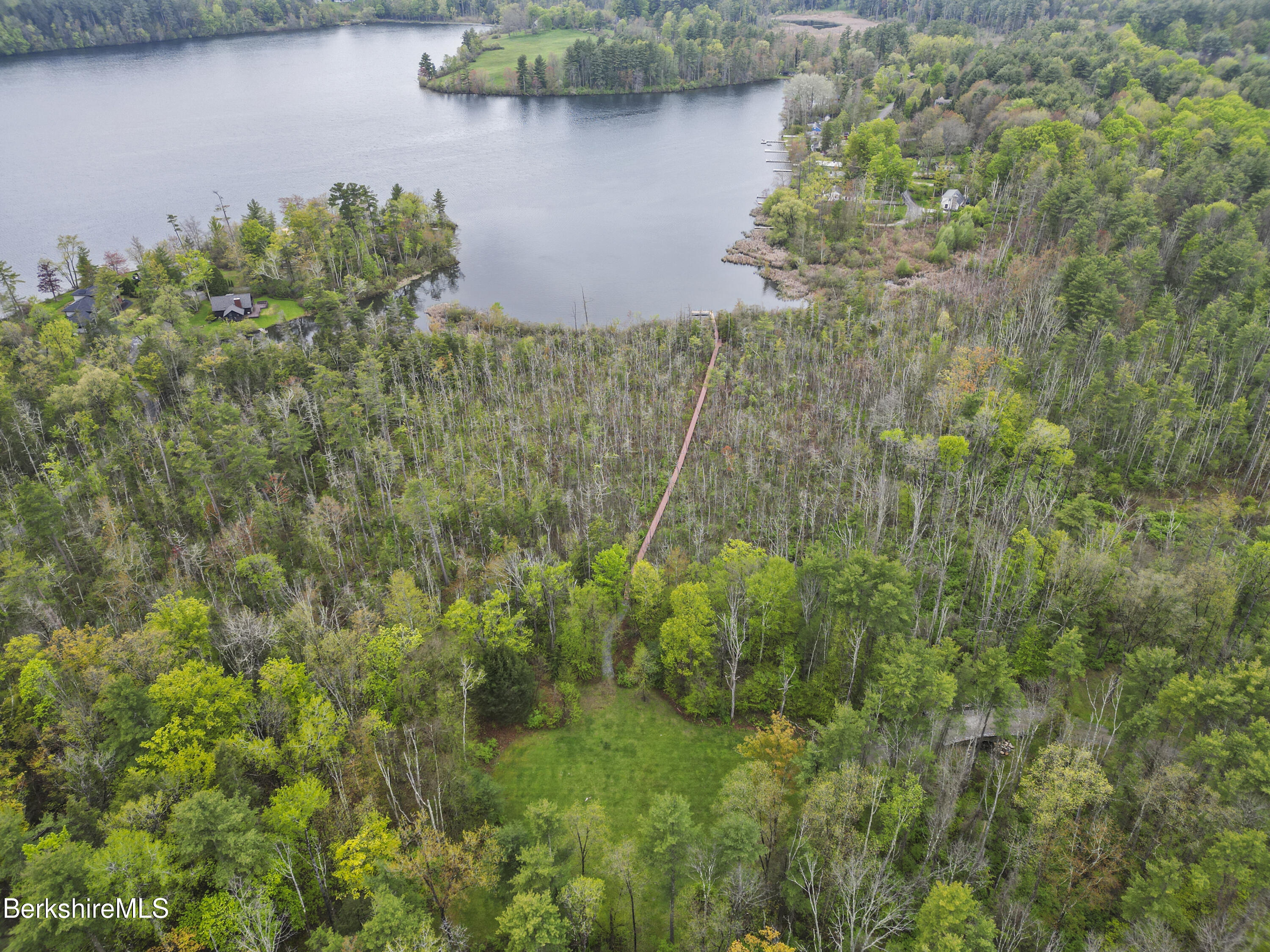 286 Lee Road Lenox, MA 01240 - Photo 21 of 26 a view of a lake with a park
