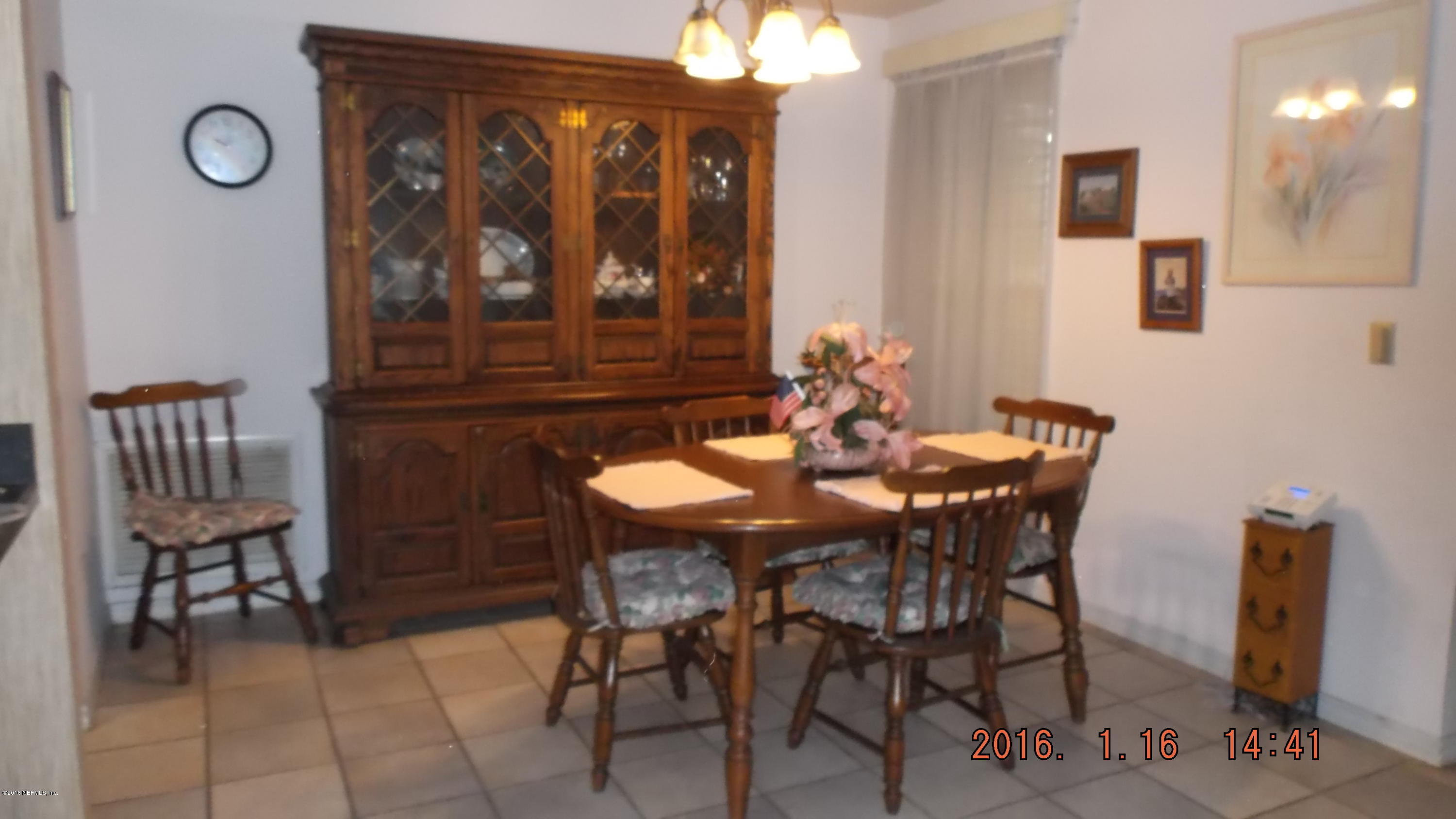 8222 Springtree Road Jacksonville, FL 32210 - Photo 7 of 17 sptdinning