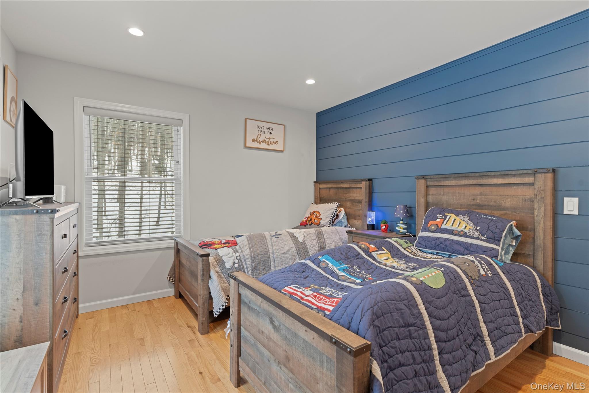 65 Beaver Road LaGrangeville, NY 12540 - Photo 20 of 40 a bedroom with a bed and a flat screen tv