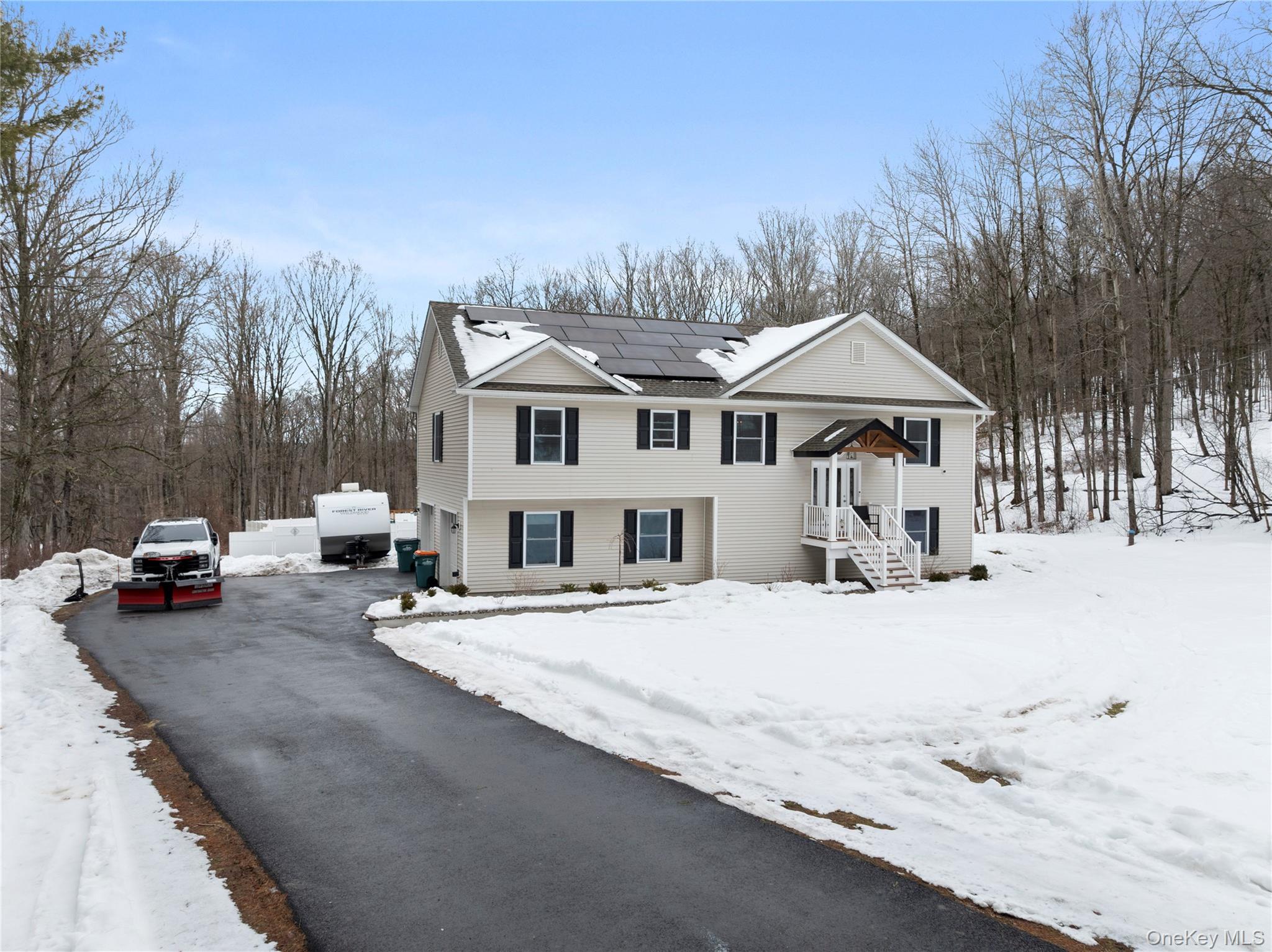 65 Beaver Road LaGrangeville, NY 12540 - Photo 2 of 40 a view of a house with snow on the road