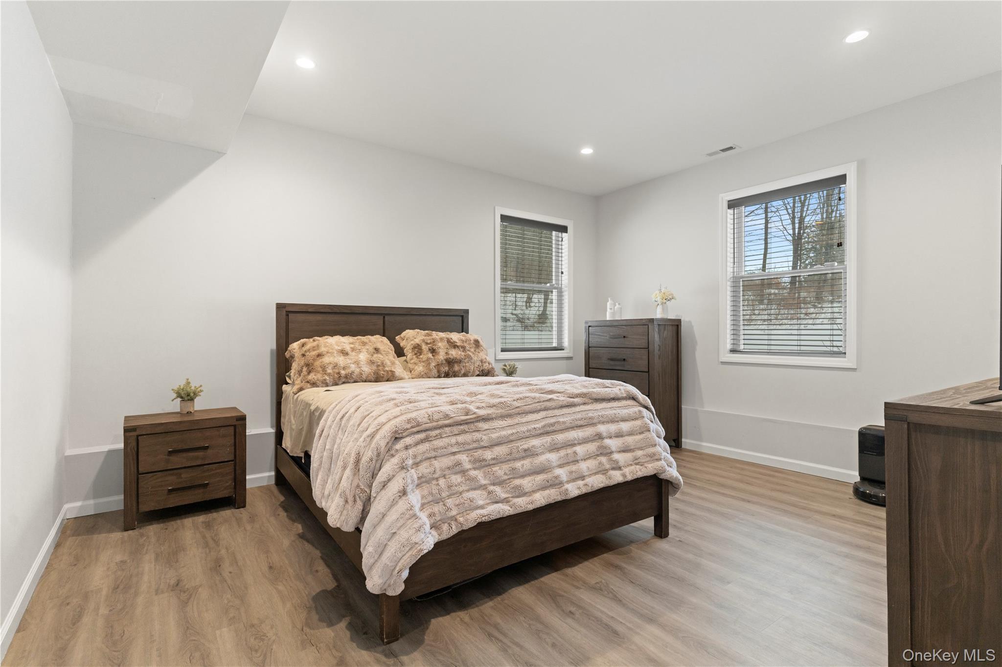 65 Beaver Road LaGrangeville, NY 12540 - Photo 22 of 40 a bedroom with a bed and wooden floor