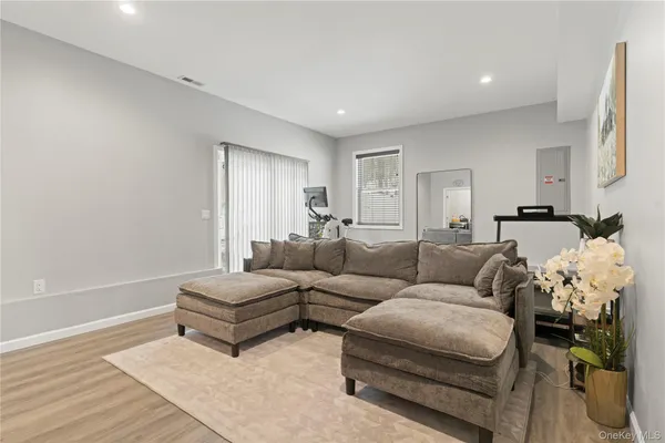 a living room with furniture and a table