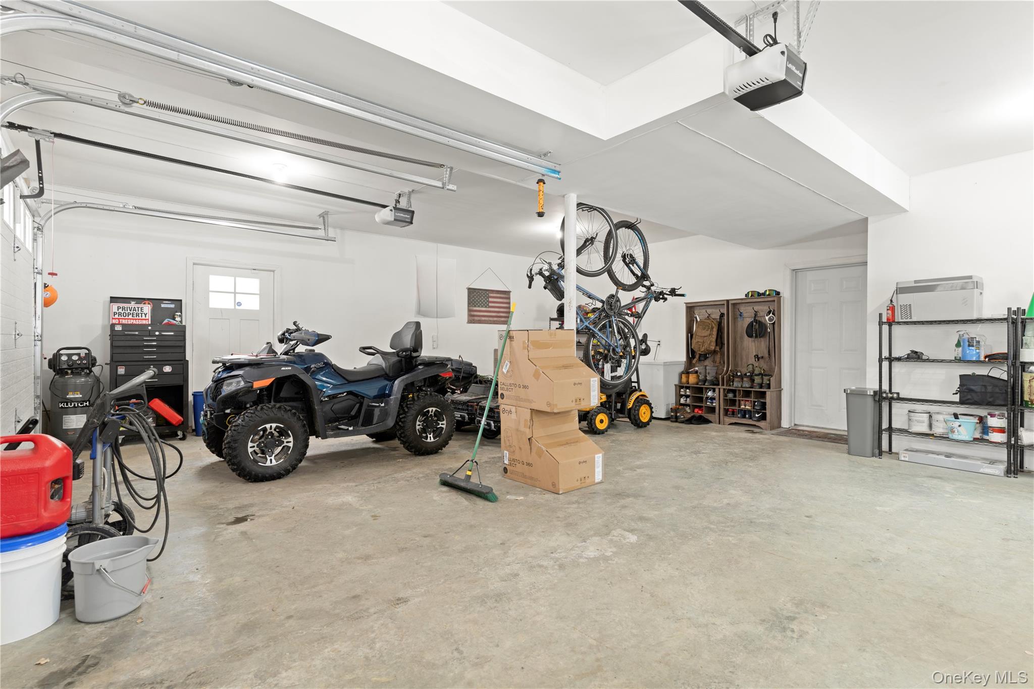 65 Beaver Road LaGrangeville, NY 12540 - Photo 30 of 40 a view of a garage with a bike and car