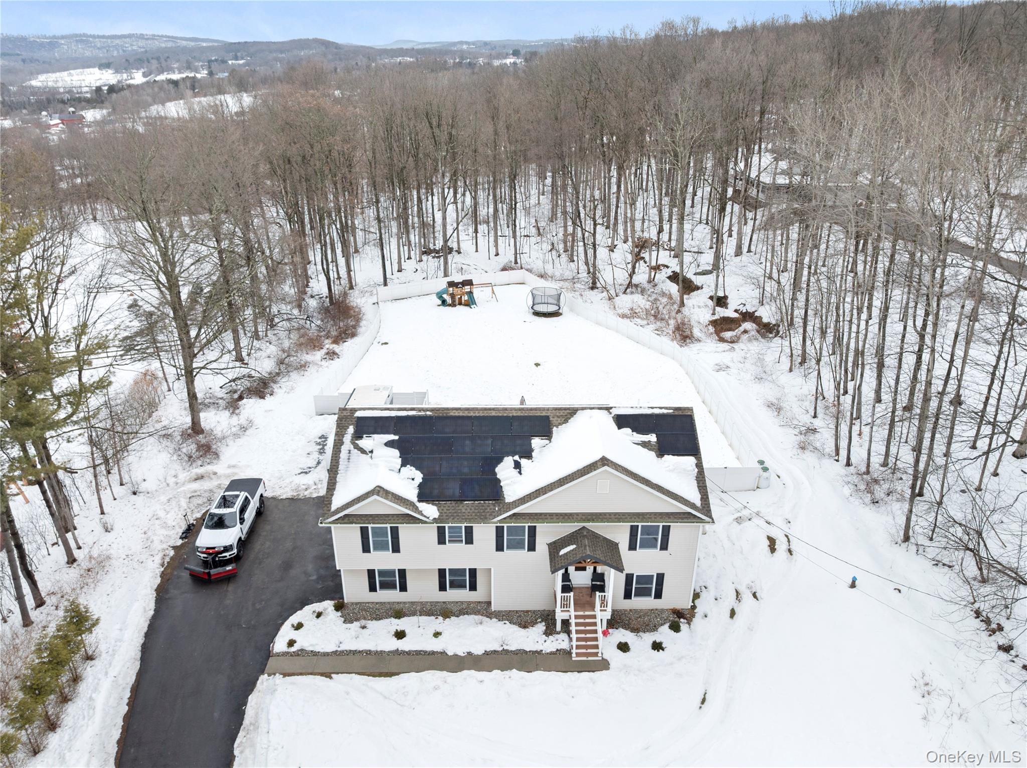 65 Beaver Road LaGrangeville, NY 12540 - Photo 31 of 40 a view of a house with a yard
