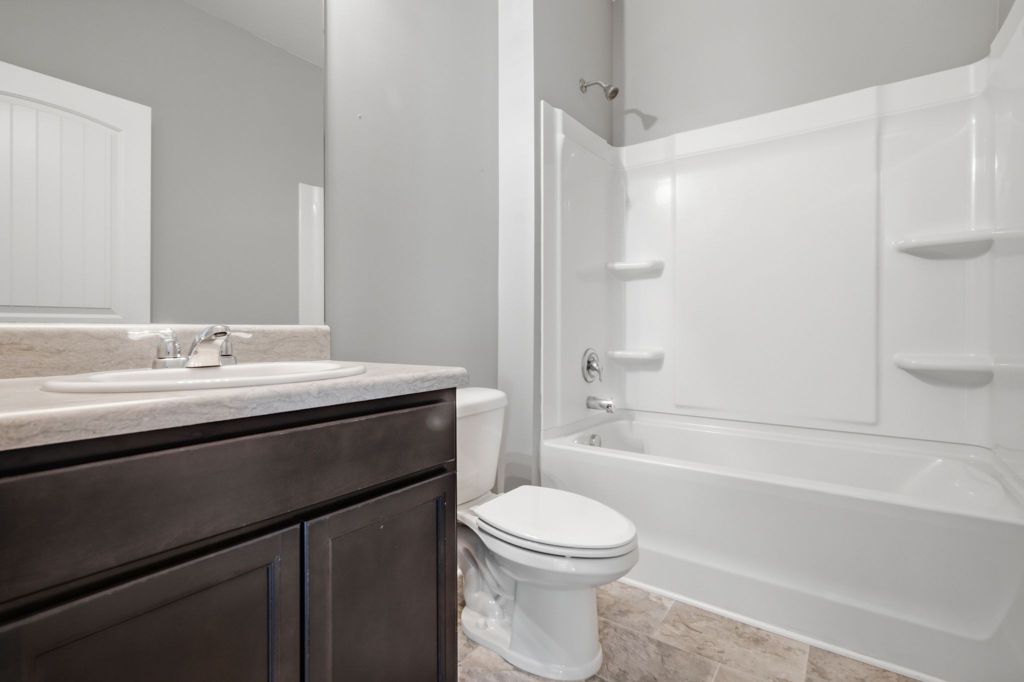 514 Ash Street Lebanon, TN 37087 - Photo 22 of 37 a bathroom with a sink a toilet and shower