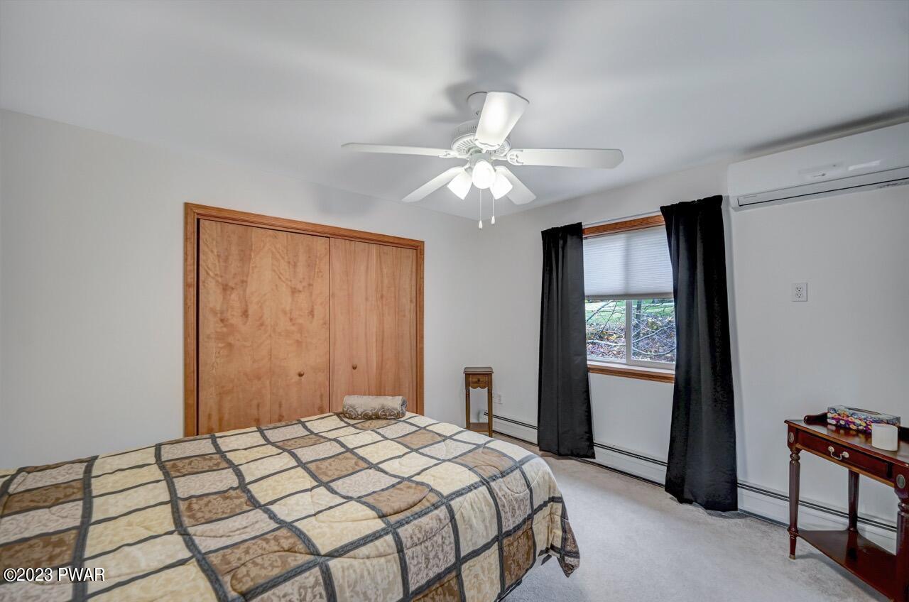 1294 Brookfield Road Lake Ariel, PA 18436 - Photo 39 of 75 a bedroom with a bed and a window
