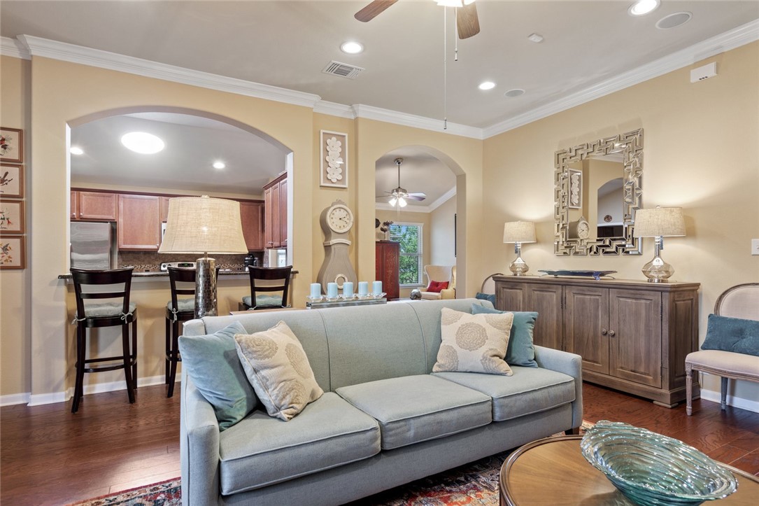 1901 Discovery Boulevard Cedar Park, TX 78613 - Photo 14 of 40 a living room with furniture kitchen view and a wooden floor