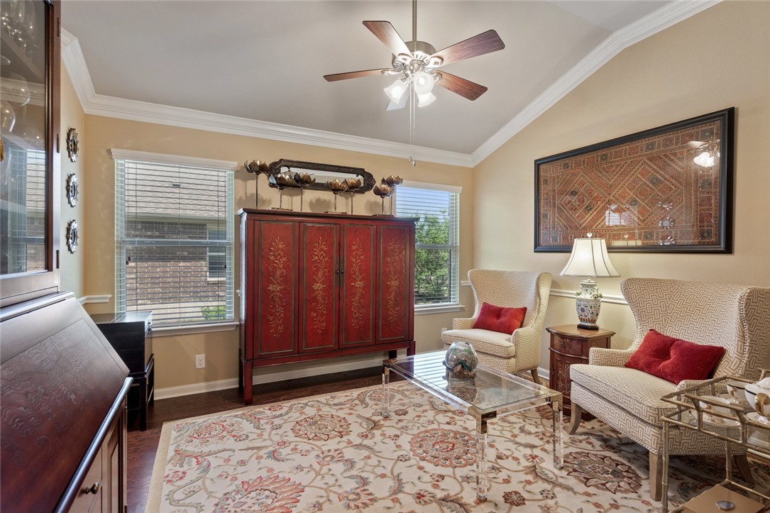 1901 Discovery Boulevard Cedar Park, TX 78613 - Photo 15 of 40 a living room with furniture a window and a flat screen tv