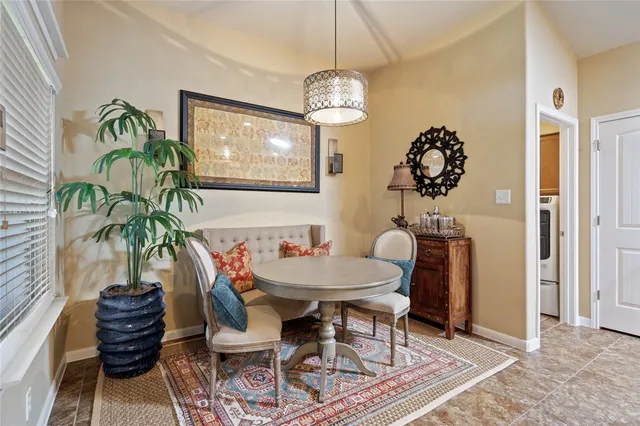 a bedroom with a bed dresser and a window