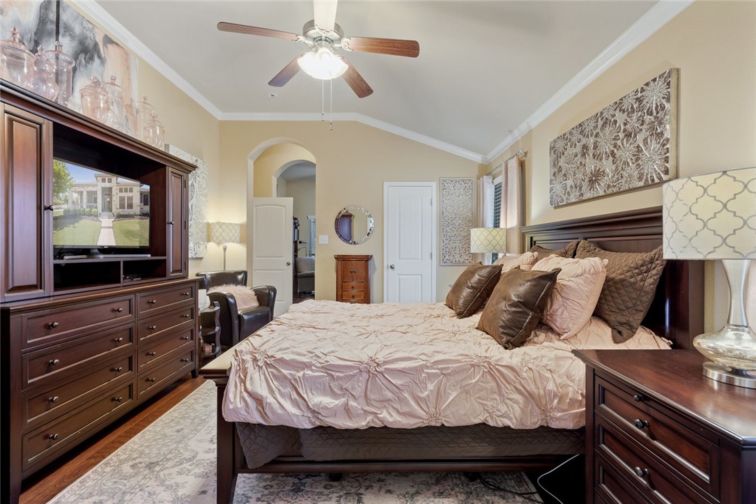 1901 Discovery Boulevard Cedar Park, TX 78613 - Photo 26 of 40 a bedroom with a bed and a flat screen tv