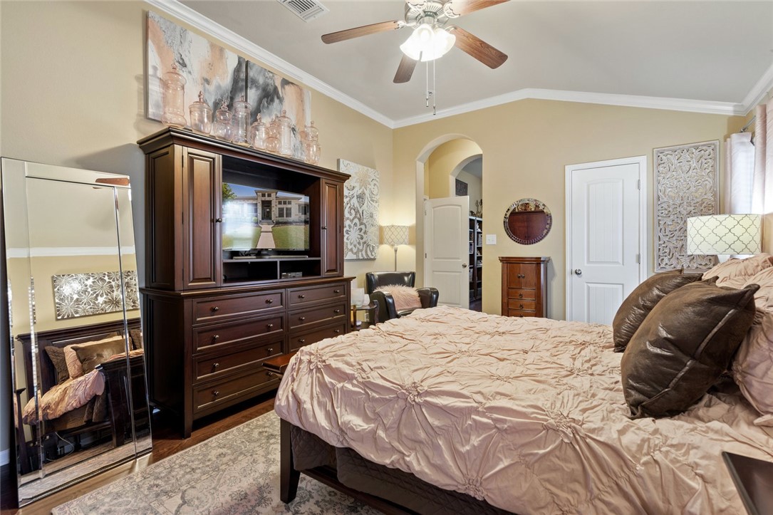 1901 Discovery Boulevard Cedar Park, TX 78613 - Photo 28 of 40 a bedroom with a bed and a flat screen tv