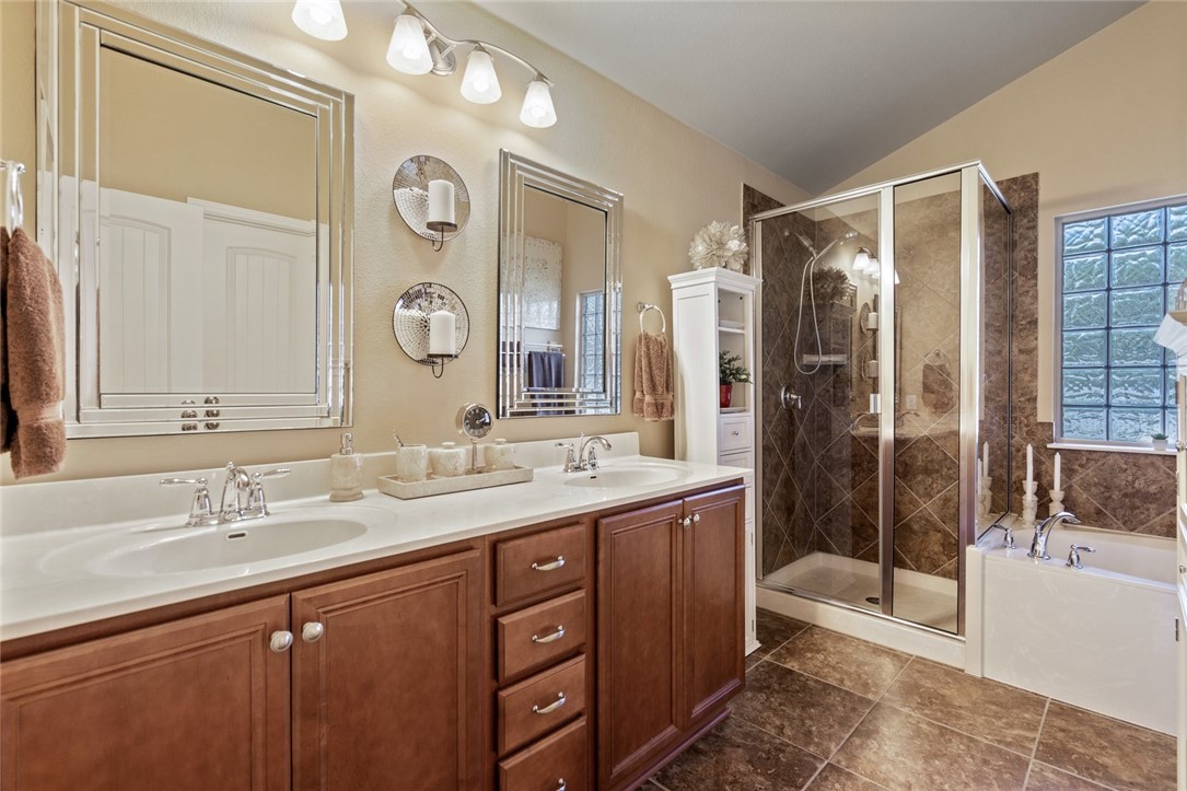 1901 Discovery Boulevard Cedar Park, TX 78613 - Photo 29 of 40 a bathroom with a double vanity sink and a mirror