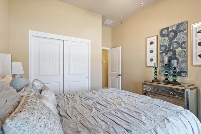 a bathroom with a toilet a sink and glass door