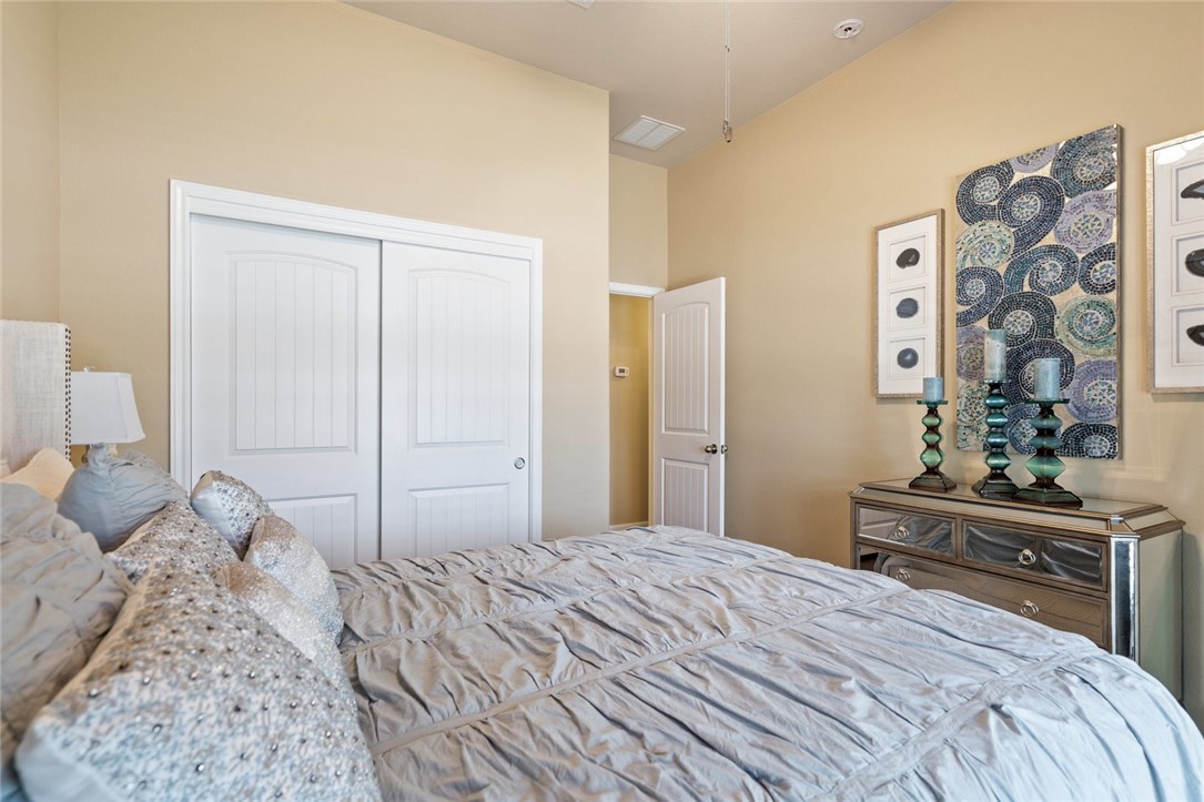 1901 Discovery Boulevard Cedar Park, TX 78613 - Photo 35 of 40 a bedroom with a bed and a dresser
