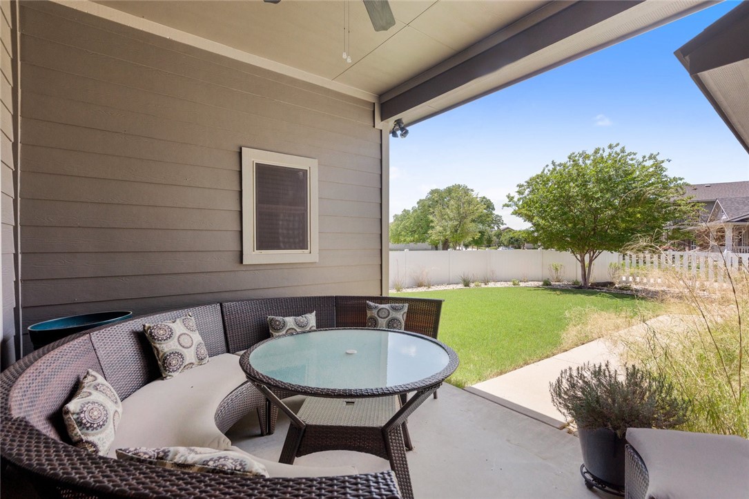 1901 Discovery Boulevard Cedar Park, TX 78613 - Photo 38 of 40 a backyard of a house with table and chairs