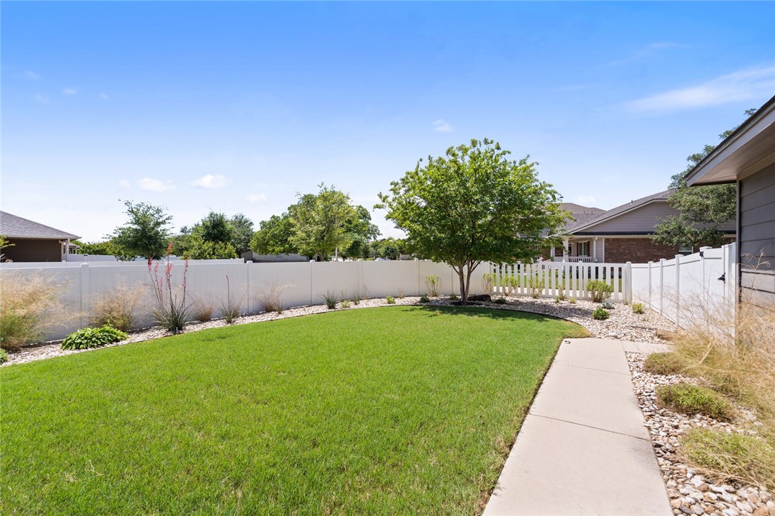 1901 Discovery Boulevard Cedar Park, TX 78613 - Photo 40 of 40 a backyard of a house with lots of green space