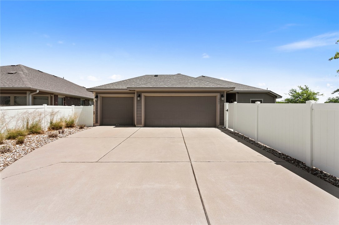 1901 Discovery Boulevard Cedar Park, TX 78613 - Photo 6 of 40 a front view of a house with a yard and garage