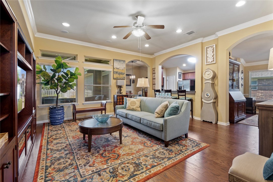 1901 Discovery Boulevard Cedar Park, TX 78613 - Photo 9 of 40 a living room with furniture a rug and a flat screen tv