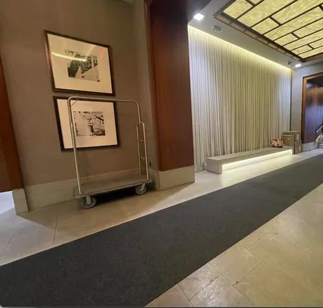 a view of a hallway with elevator
