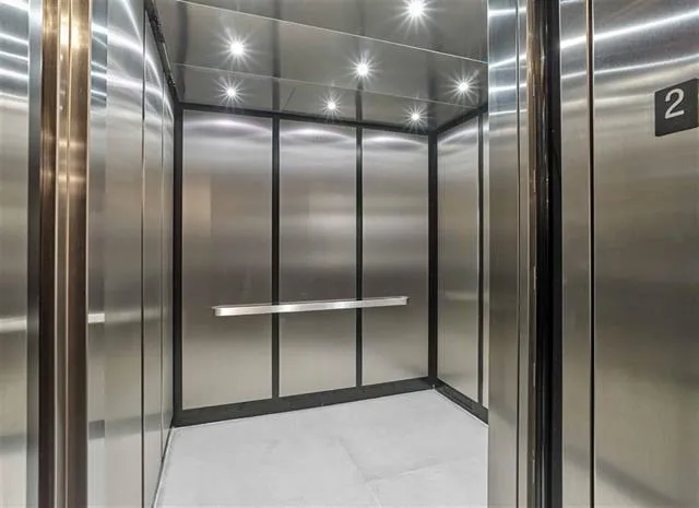 a living room with lots of furniture and a flat screen tv