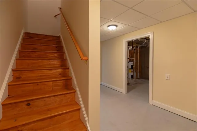 a view of a livingroom with a ceiling fan and a rug