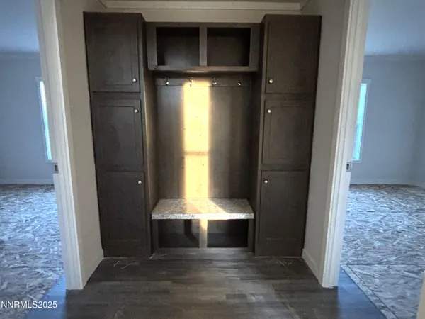 a view of a entryway door with living room