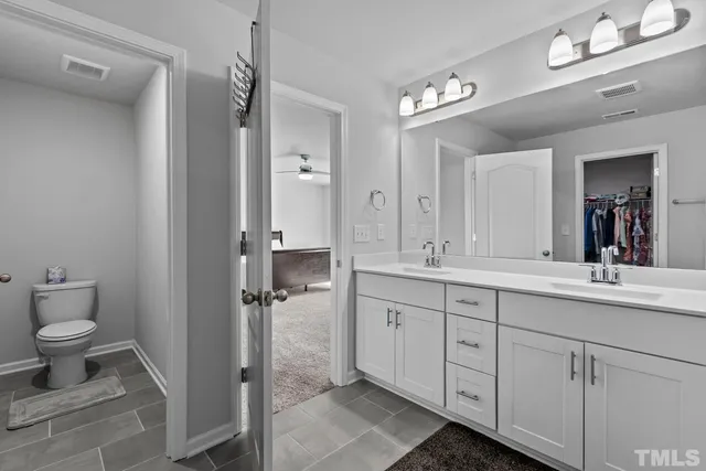 a view of a livingroom with kitchen and workspace